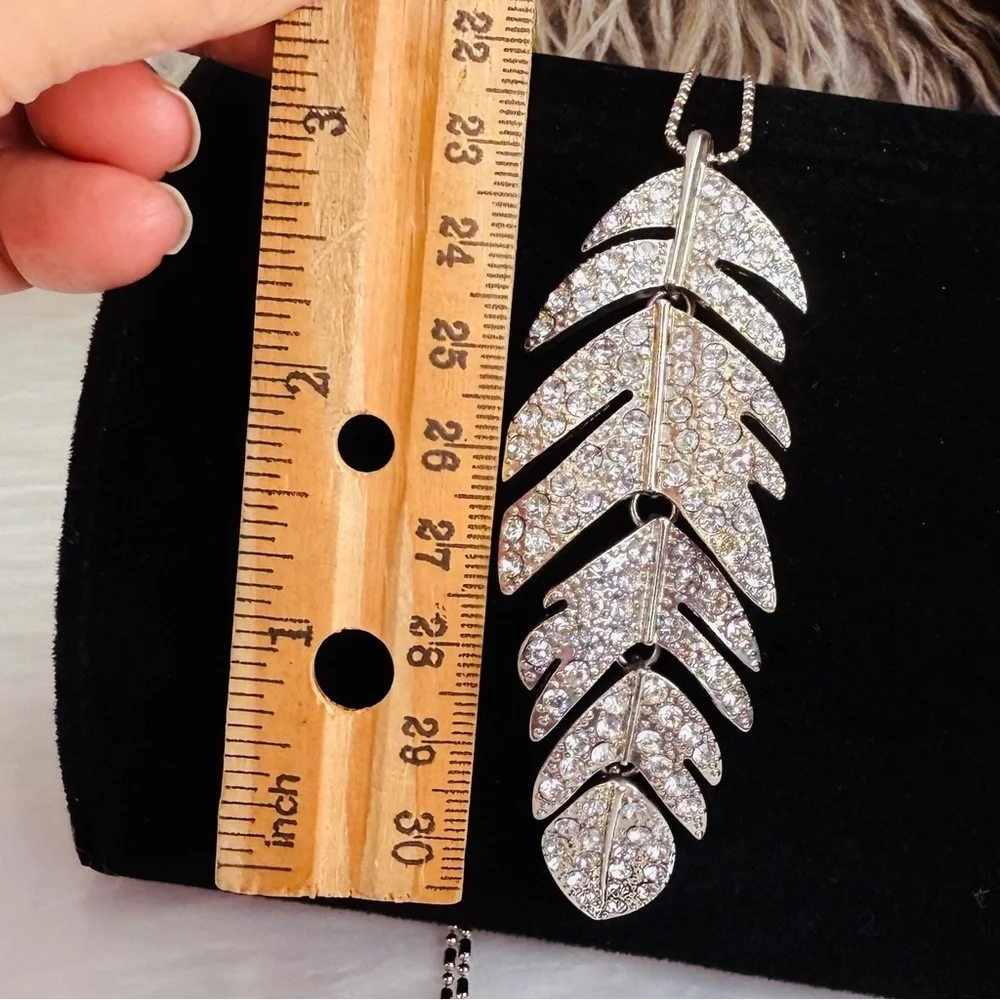 Silvertone Hinged Bling Leaf Pendant Long Necklace